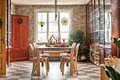 Dining area with checkered floor and Christmas decorations