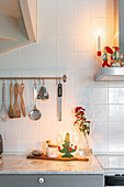 Kitchen worktop with Christmas decorations and kitchen utensils