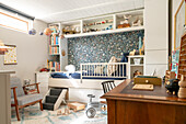 Children's room with loft bed, desk and vintage decorations