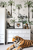 Children's room with safari theme and plush tiger