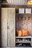 Wooden wardrobe with cupboard, bench and shoe rack
