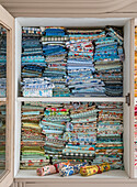 Colorful fabrics in a cupboard