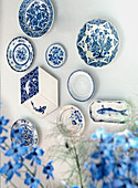 Decorative blue and white wall plates with floral patterns