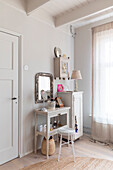 Dressing table with mirror and storage in bright bedroom