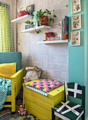 Colourful corner in the children's room with wall shelves