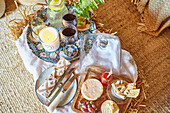 Rustic breakfast with decorative candle and snacks in the hayloft