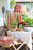 Set garden table with DIY raffia lampshades