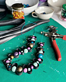 Crafted necklace made from colourful beads and bicycle inner tube