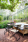 Cosy seating area in the greenhouse