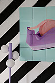 Large-format pop art wall art, modern floor lamp and striped wall