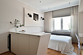 Modern studio flat with integrated kitchenette and sleeping area