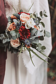 Bridal bouquet with roses, gerberas and eucalyptus branches