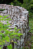 Gabion wall made of natural stones in the garden