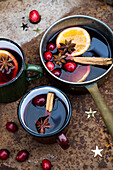 Hot mulled wine flavoured with oranges, cinnamon and star anise