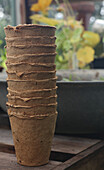 Pile of peat pots in the greenhouse