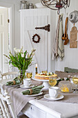 Springtime table setting in country house kitchen