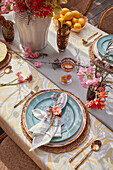 Spring table decorations with colourful flowers