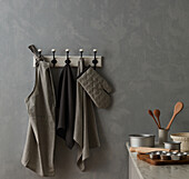 Kitchen towels, oven glove and baking utensils