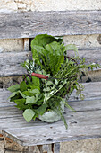 Basket of freshly collected wild herbs for the metabolism