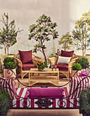 Garden terrace with rattan chairs, red and white striped sofa and botanical wall painting