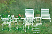 Chairs and table set in the garden. Sun loungers. Outdoor furniture., Taoyuan county, Taiwan, Asia.