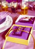 Christmas table decoration in purple and yellow