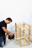 Making wooden folding table (cutting off protruding ends)