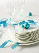 Tableware and glasses with turquoise decorations
