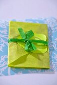 Green envelope with bow