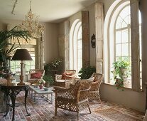 An orangerie with wicker chairs