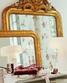 Two antique mirrors on a dressing table