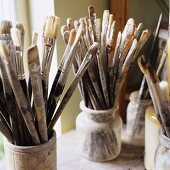 Artists brushes in glasses