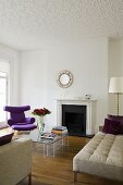 An elegant, decoratively designed living room with a fireplace