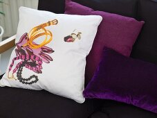 Cushions with designs in shades of red