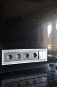 Built in electrical sockets in kitchen splashback