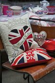 Union flag cushions on a vintage chair