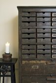 An antique drawer unit