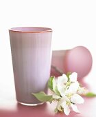 Pink glass vases with apple blossom