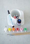 Utensils for painting porcelain: crockery, paint, fine liners and brushes