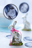 An Easter Bunny with a photo as a name card for an Easter table