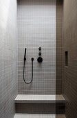 Tiled modern bathroom with purist look