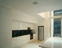 White kitchen with dining area