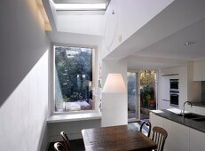 Kitchen with dining area, terrace doors & skylight
