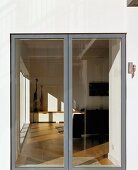 View of living space through glass door