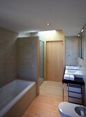 Simple bathroom with partitioned shower area