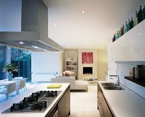 View from open-plan, fitted kitchen counter of seating and dining areas