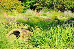 Herbaceous borders and amphorae in park (Killesbergpark, Stuttgart, Germany)