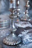 Silver candlesticks on festive table