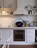 Country house style kitchen counter with extractor hood