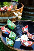Paper boats on miniature ponds